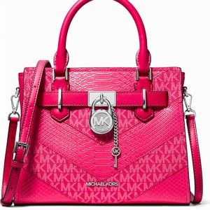 NWT. Michael Kors crossbody bag with logo background and embossed snake skin ♥️